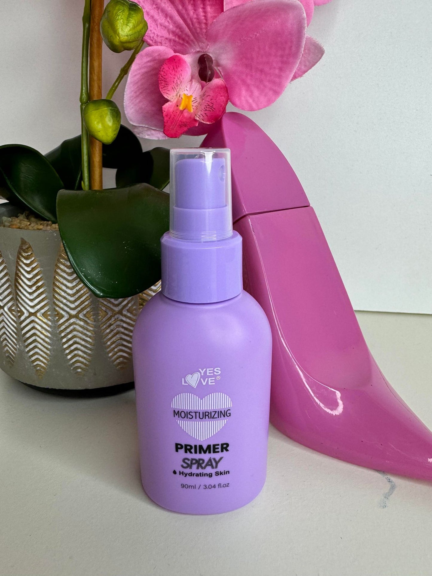 Spray fixateur hydratant