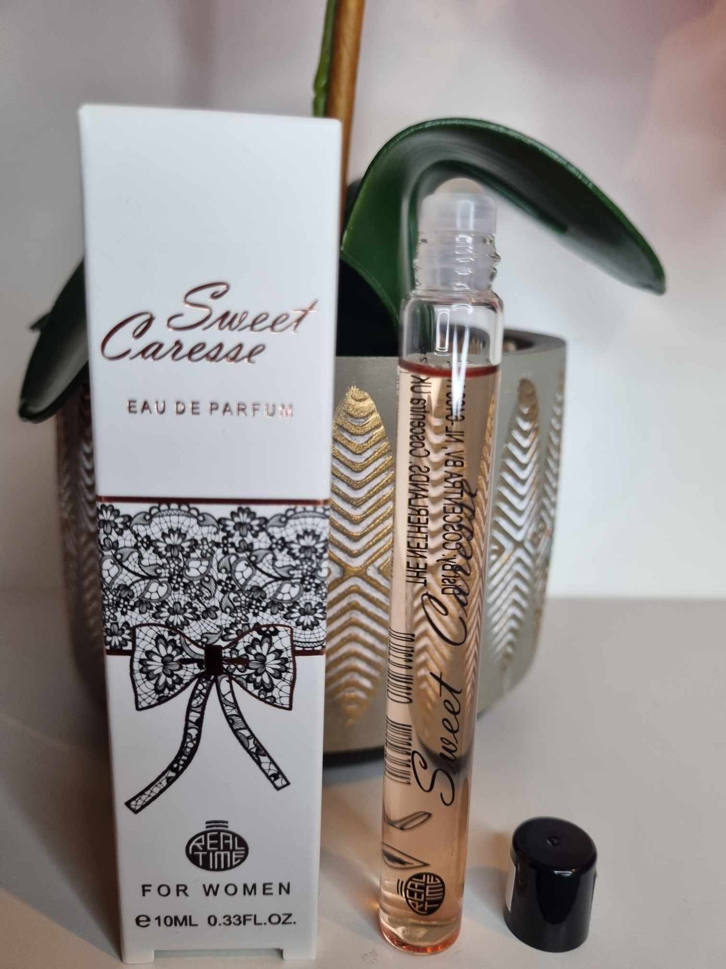 Parfum Ron Rolls femme